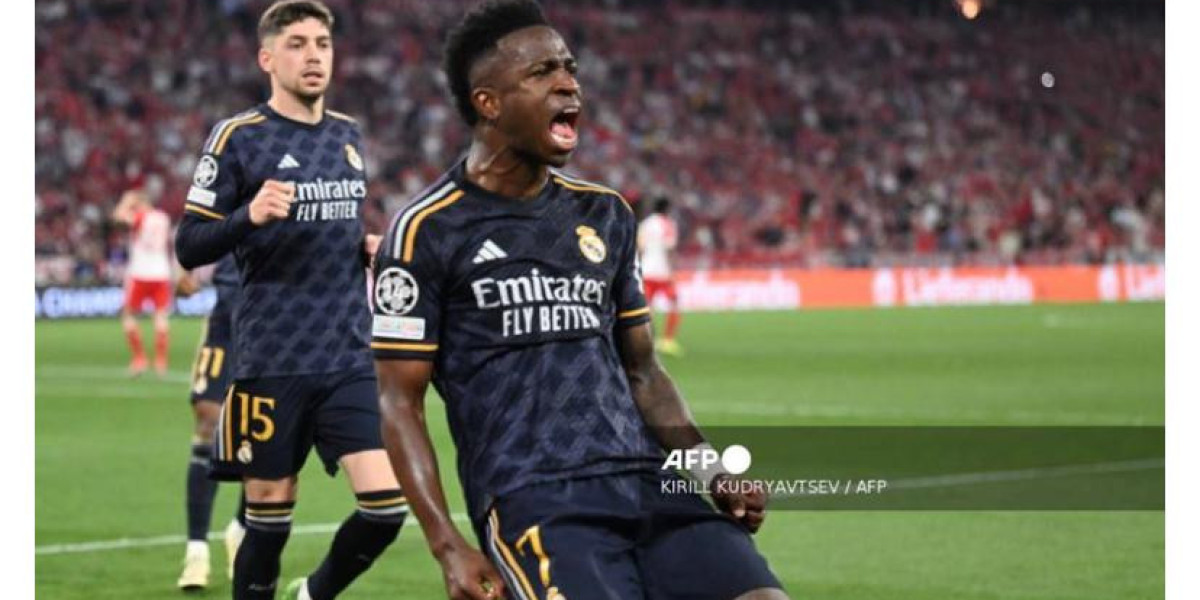 Vinicius Rescues Real Madrid with Late Penalty in Thrilling Draw Against Bayern Munich